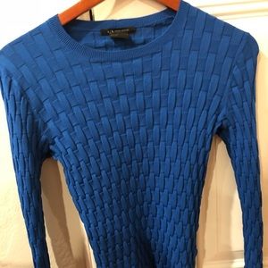 Used once Longs sleeve blouse color blue.